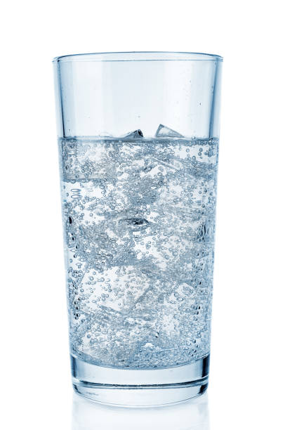 istock Glass with pure sparkling soda and ice on white background 930193460