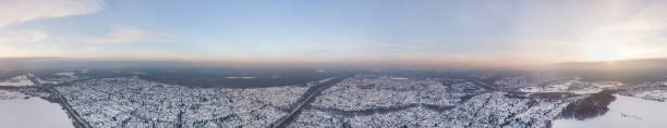 istock panoramic view from the air to the snow-covered village 930196944