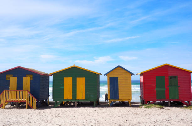 istock Bright huts on Muizenberg beach, Cape Town, South africa 930207500