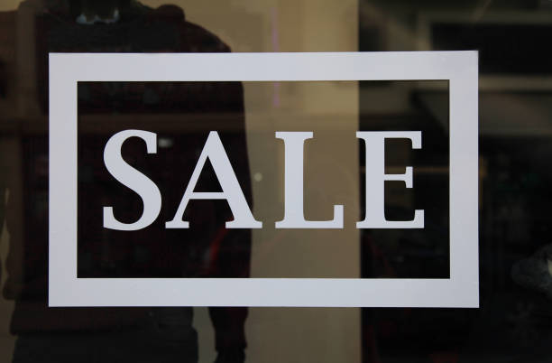 istock Sale sign on the shop window. 930212754