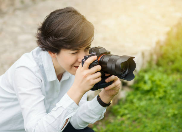 istock Young woman taking pictures 930216344