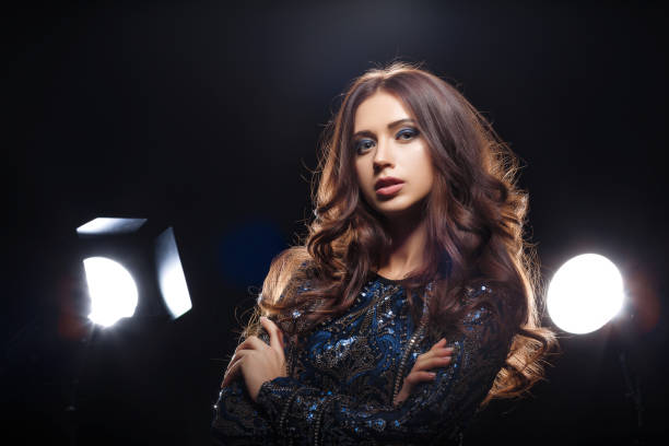 istock model in dress posing in front of camera 930222562