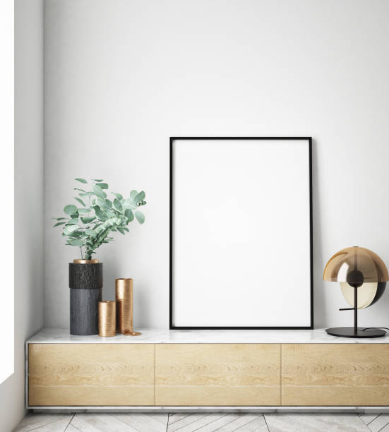 istock mock up poster frame in hipster interior background, scandinavian style, 3D render 930239400
