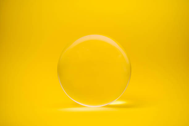 istock Close-Up Of Crystal Ball Against Red Background 930256802