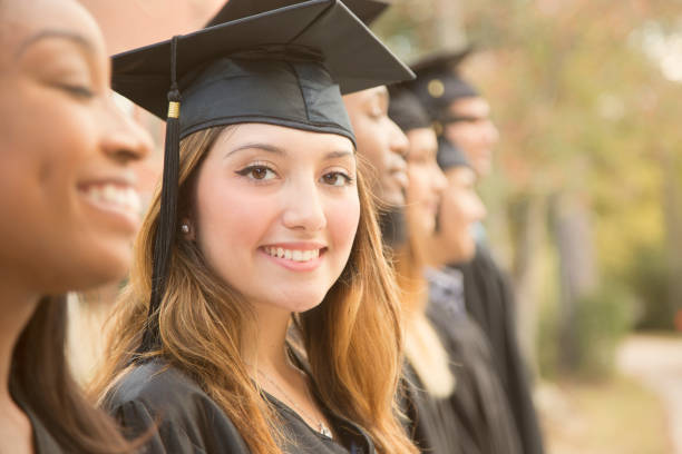 istock Latin descent female college student graduation on campus. 930278006