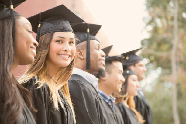 istock Latin descent female college student graduation on campus. 930278260