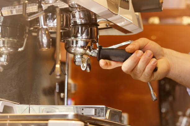 istock Cropped Image Of Barista Making Coffee In Cafe 930279172