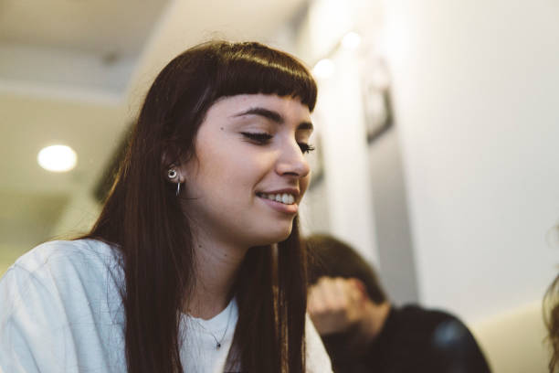 istock Smiling young woman during a coffee break 930281474