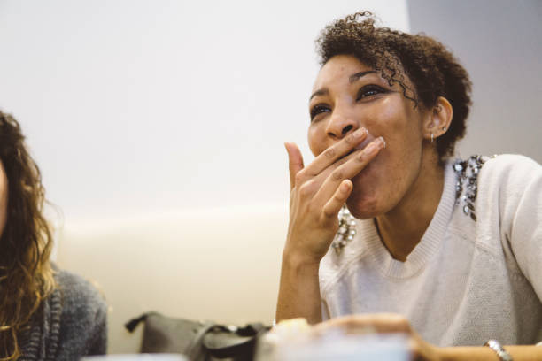 istock Smiling young woman during a coffee break 930281482