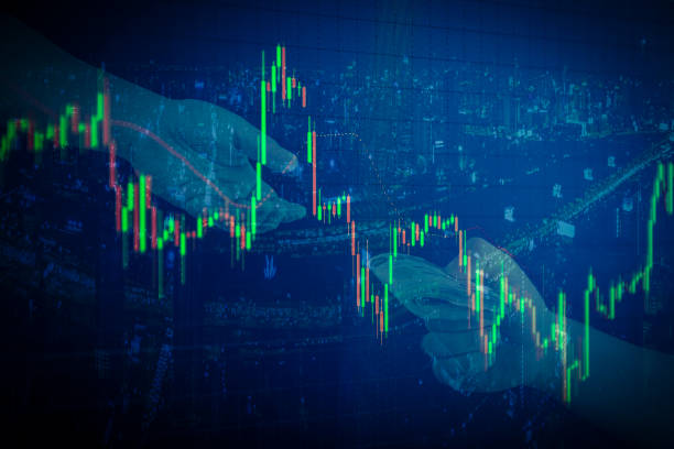 istock candlestick graph office building background , Business and financial concept 930290692