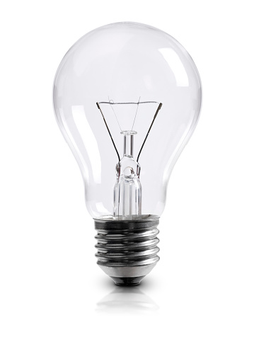 Transparent tungsten glowing light bulb with shining light, isolated on blue background. Innovation, effective thinking, inspiration, invention, creative idea, energy saving concept. 3D illustration