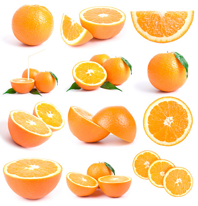 falling fresh orange fruit slices isolated over white background closeup. Flying food concept. Top view. Flat lay. Orange slice in air, without shadow.