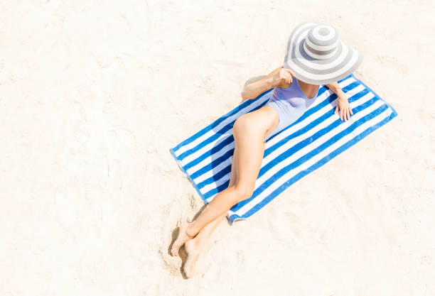 istock Woman at tropical beach 930305042
