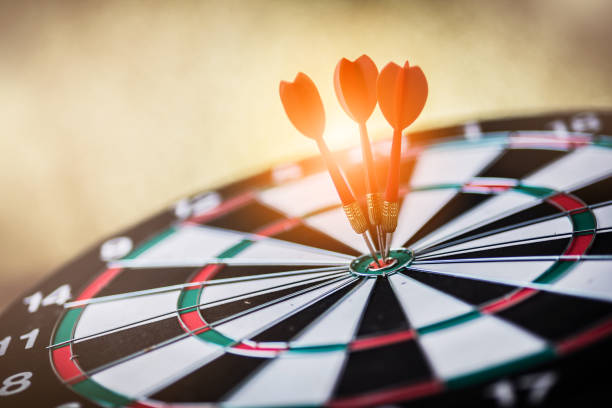 istock red three darts arrows in the target center 930305060