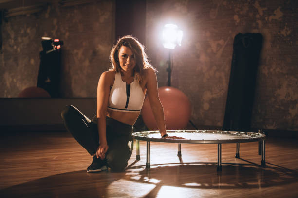 istock Beautiful woman in the gym 930309498