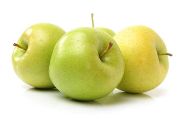 istock Split white into green and green green apple fruits on white background 930311958