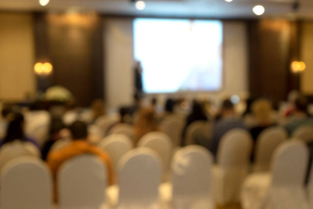 istock Blur of seminar room in convention hall 930334692