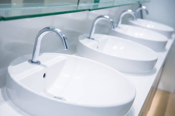 istock Row of washing sink in bathroom 930341764
