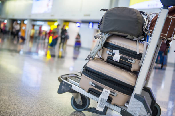 istock Airport luggage trolley with suitcases 930341766