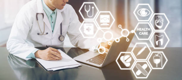 istock Medical concept - Doctor on Computer with Icons 930344162