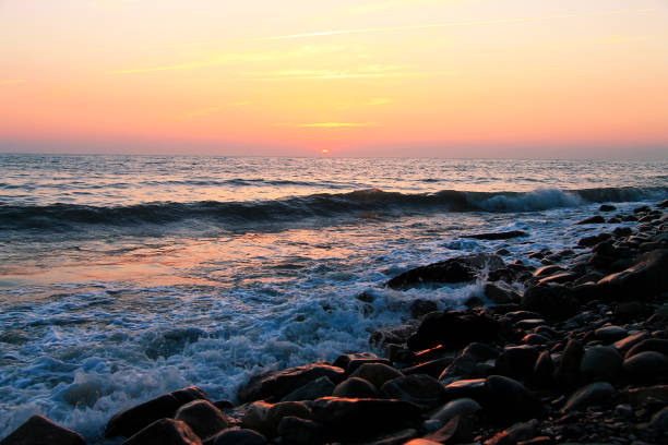 istock Sunset over the Black sea and summertime beach 930375194
