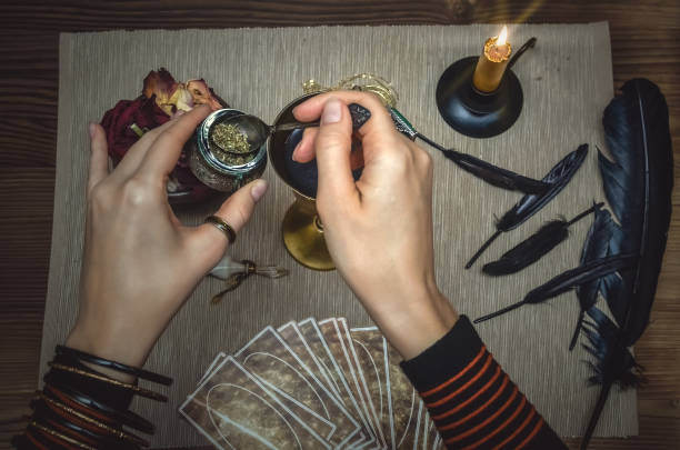 istock Magic potion in ancient goblet. The magic cure. Poison charm. Paranormal table. 930382094
