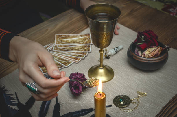 istock Magic potion in ancient goblet. The magic cure. Poison charm. Paranormal table. 930382134