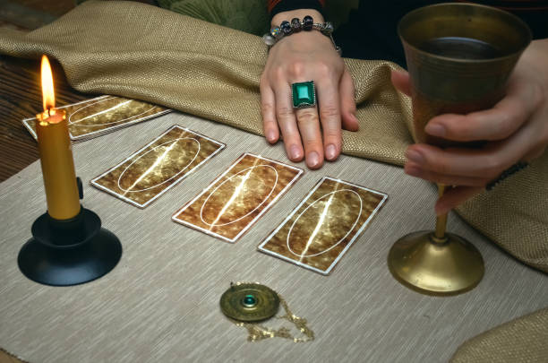 istock Tarot cards. Future reading concept. Fortune teller desk table. 930382330