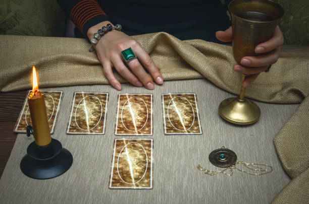 istock Tarot cards. Future reading concept. Fortune teller desk table. 930382336