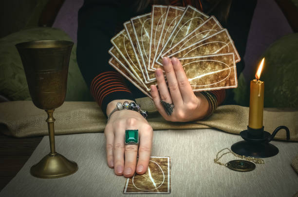 istock Tarot cards. Future reading concept. Fortune teller desk table. 930382368
