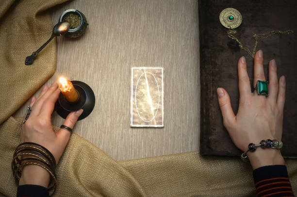 istock Tarot cards. Future reading concept. Fortune teller desk table. Book of magic. 930382444
