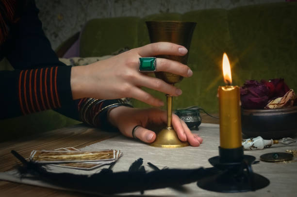 istock Magic potion in ancient goblet. The magic cure. Poison charm. Paranormal table. 930382684