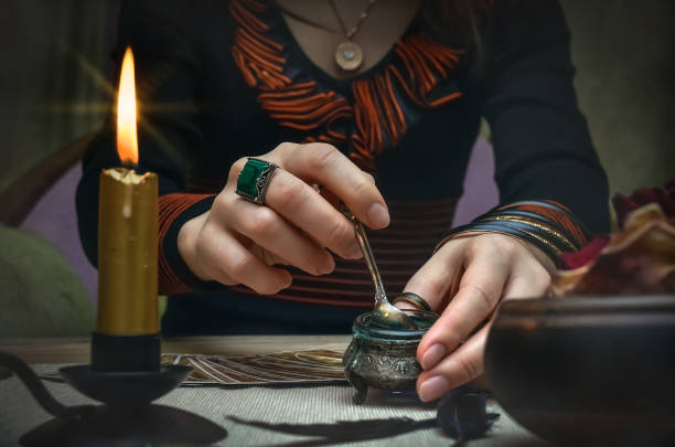istock Tarot cards on fortune teller desk table. Future reading concept. 930385024