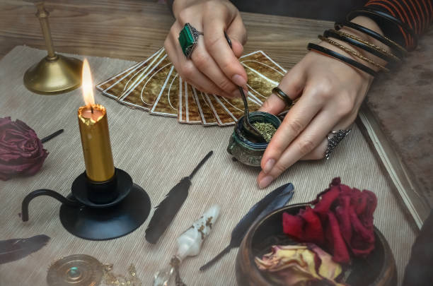istock Tarot cards on fortune teller desk table. Future reading concept. 930385030