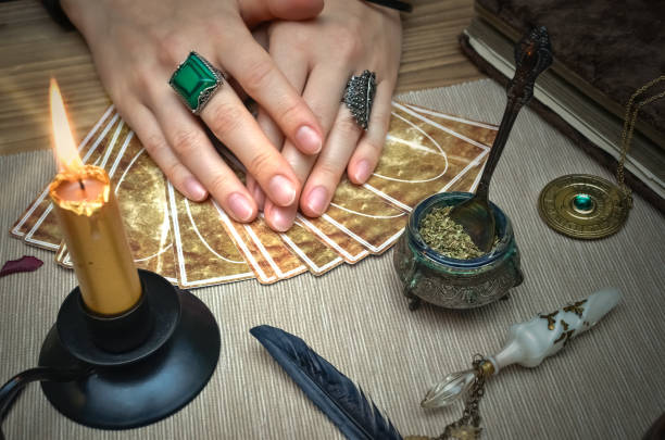 istock Tarot cards on fortune teller desk table. Future reading concept. 930385046