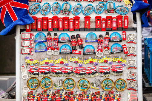 LONDON, UK - OCTOBER 28, 2012: Street stall with typical London tourist fridge magnet souvenirs for sale