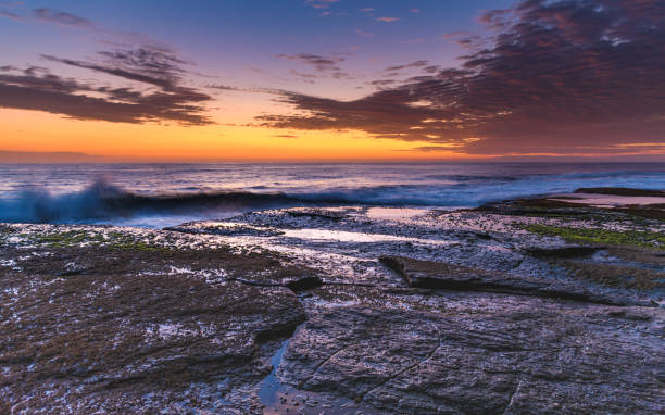 istock Cloudy and Vibrant Sunrise Seascape 930392744