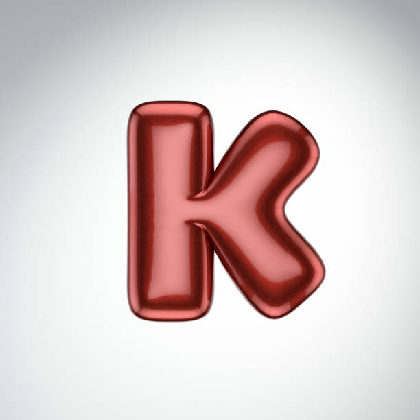 istock Glossy paint letter K. 3D render of bubble font with glint isolated on white background. 930402746