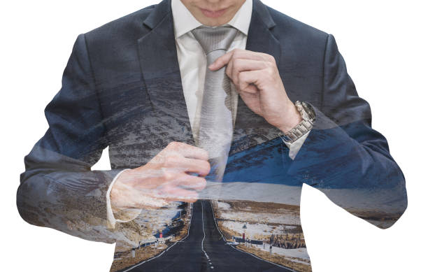 istock Double exposure businessman tying necktie with empty road, isolated on white background 930403074