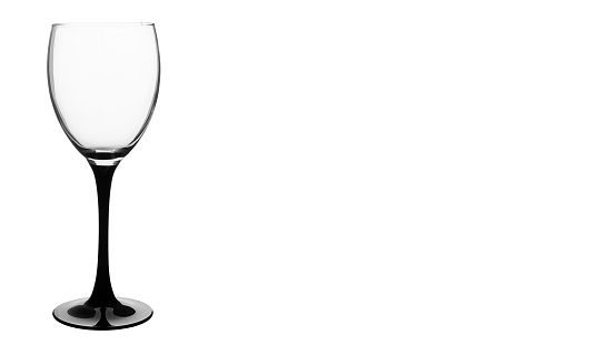 Empty old crystal wine glass isolated on white background.