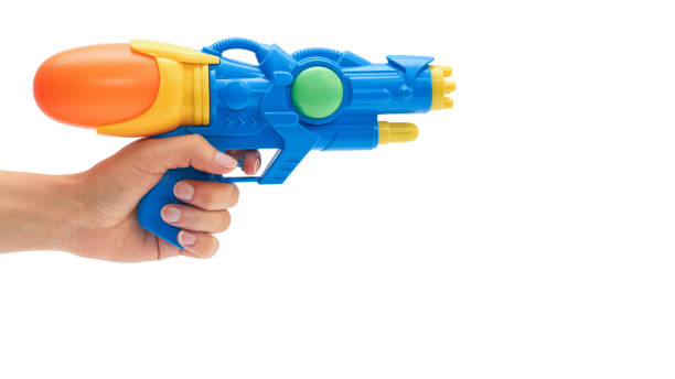 Female hand holds blue squirt gun. Isolated on white background. copy space, template