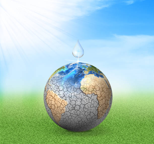 istock Water drop falls to dried planet. 930411230