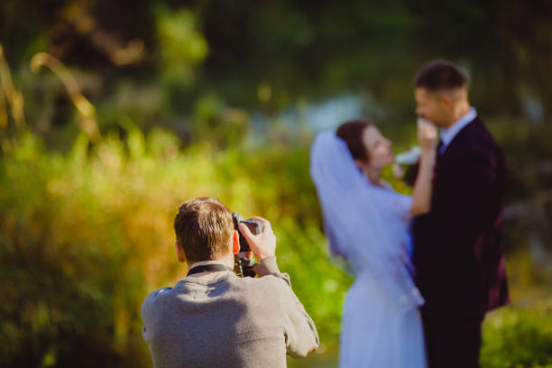 Wedding photoshoot in the summer park stock photo