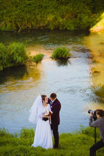 istock Wedding photoshoot near the river 930422990