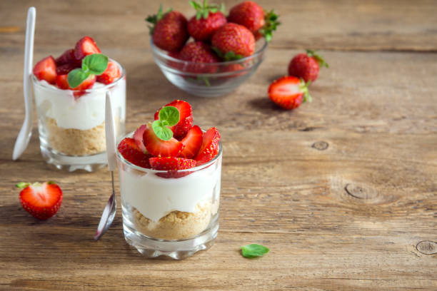 istock Strawberry cheesecake in glasses 930424674