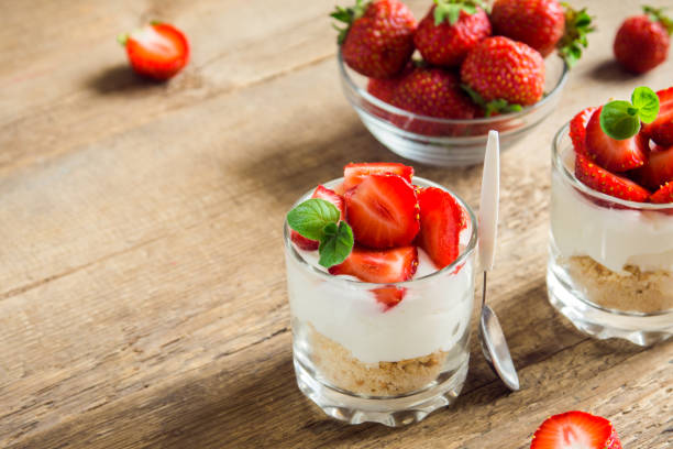 istock Strawberry cheesecake in glasses 930427558