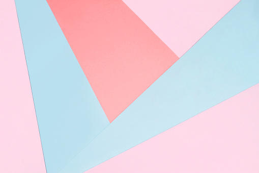 Pastel coloured paper background.
