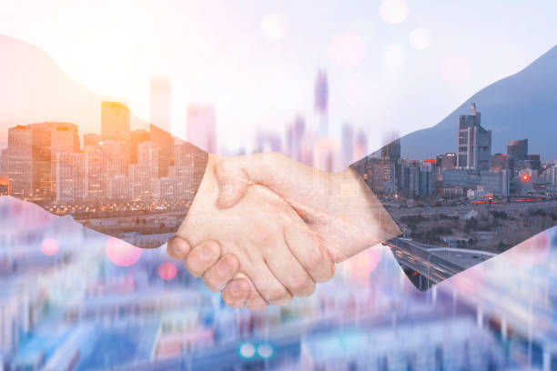 istock Deal or agreement business concept, handshake double exposure 930436932