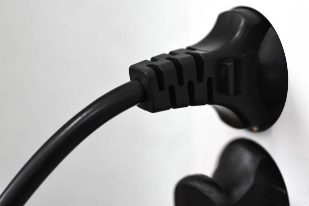 istock A plug in the cord is plugged into an electrical outlet 930441648