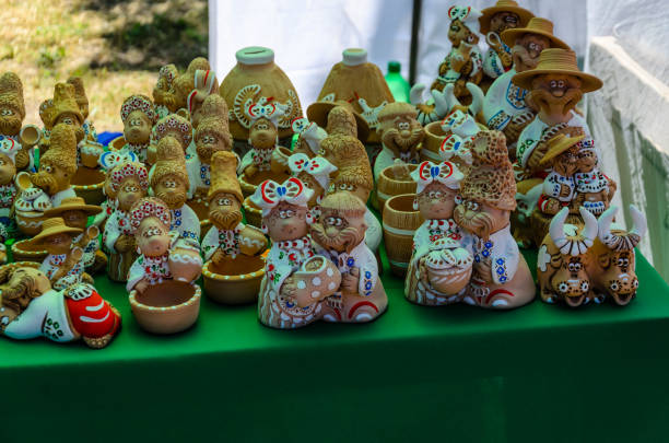 istock Different Ukrainian figurines for sale on fair 930448220